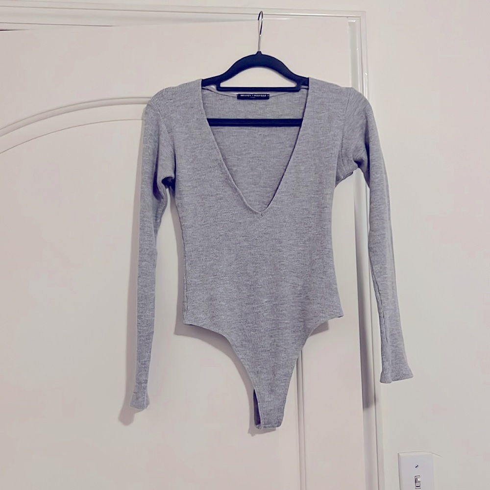Deep low cut gray bodysuit